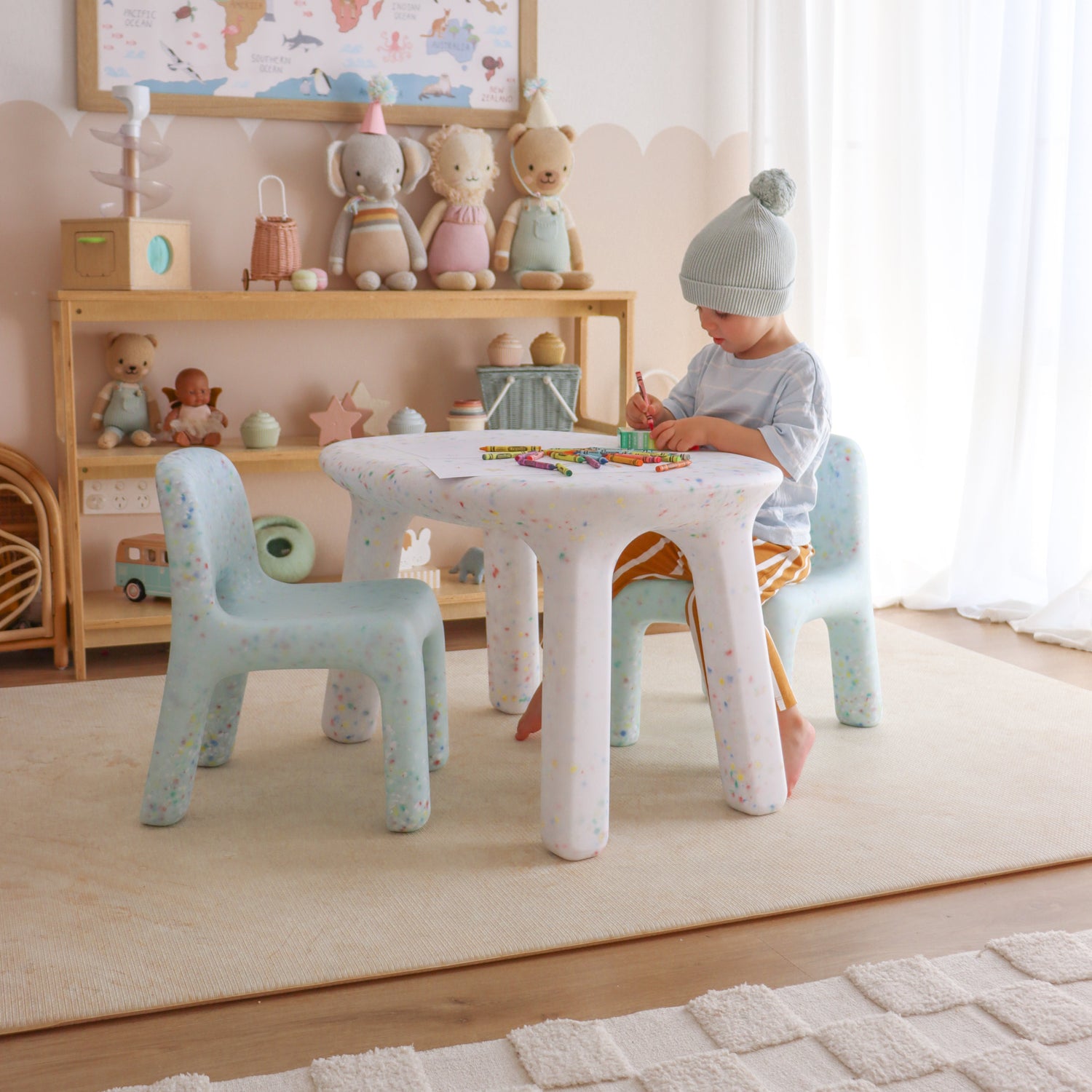 boy playing at confetti table 